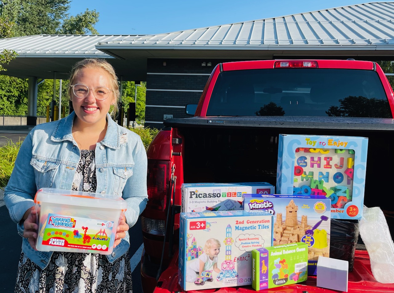 Annabelle, young lady teacher with classroom donations