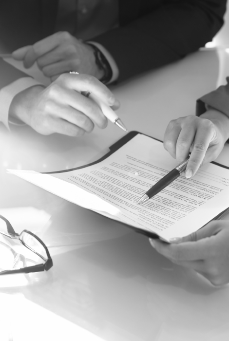 Two people looking at a document