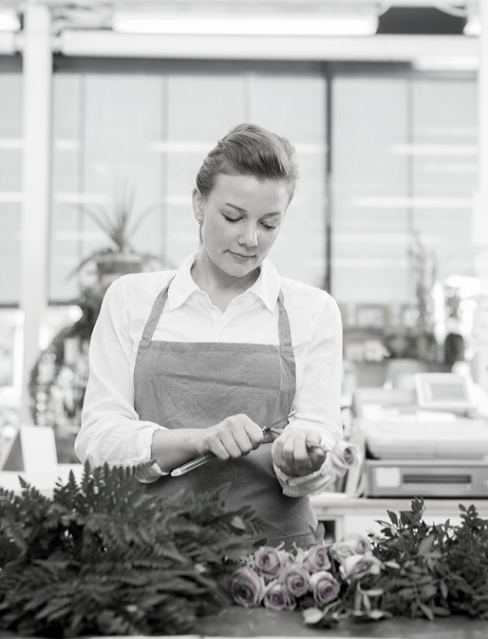 woman working at a flower shop