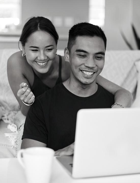 couple looking at laptop